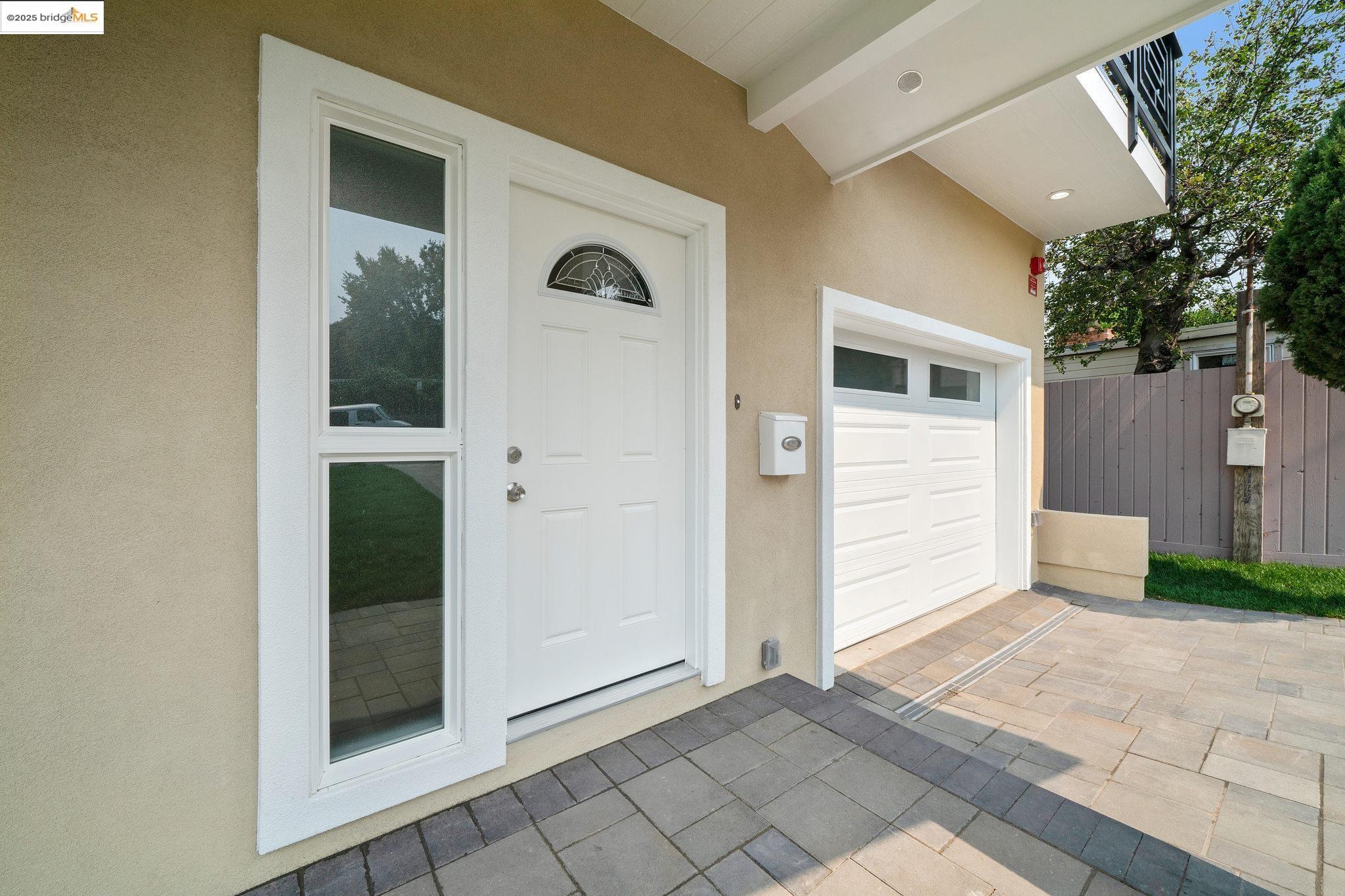 4511 Elmwood Road El Sobrante, CA 94803 - Photo 33 of 42 an empty room with windows and yard
