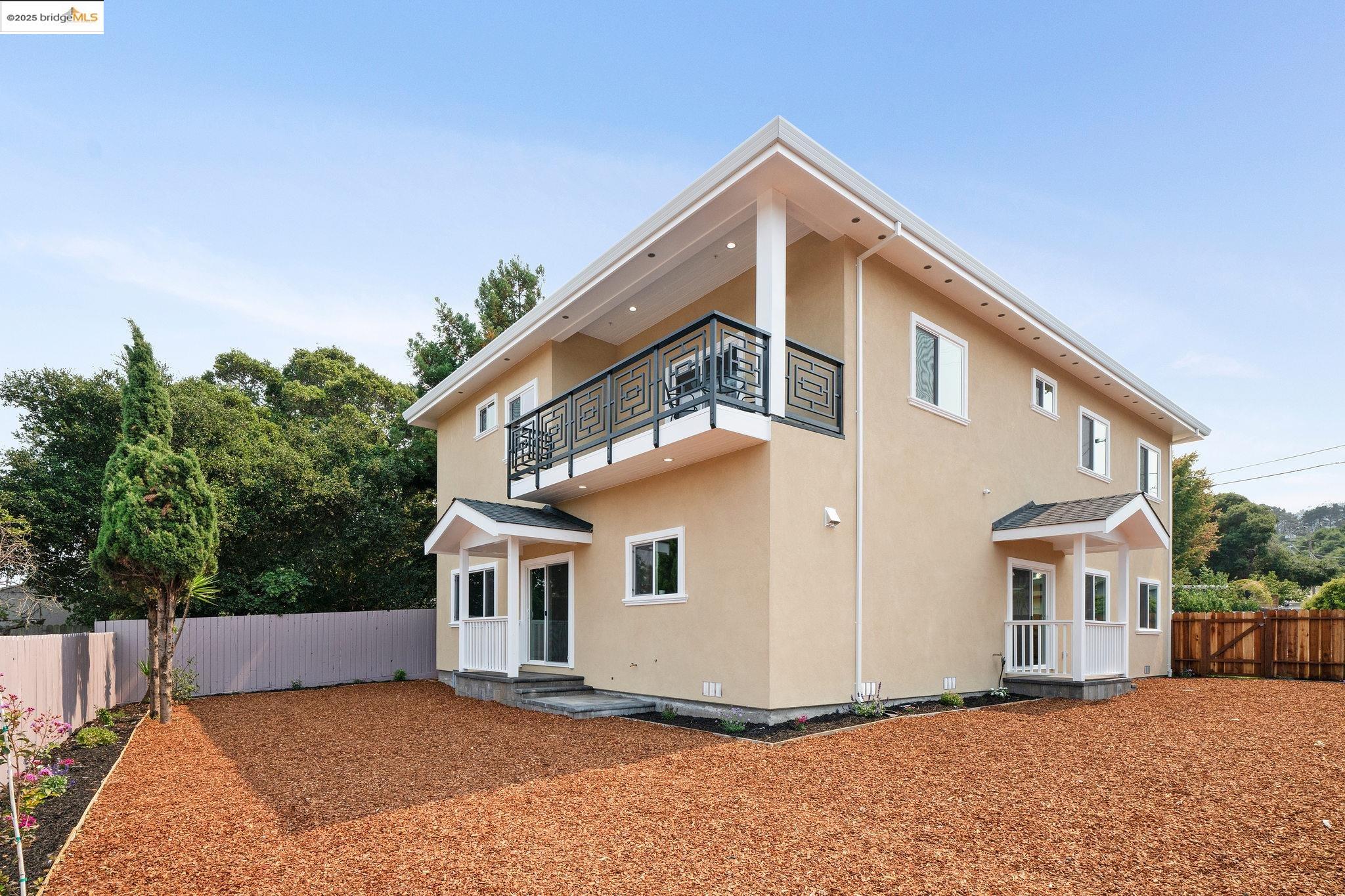 4511 Elmwood Road El Sobrante, CA 94803 - Photo 38 of 42 a view of a house with a yard