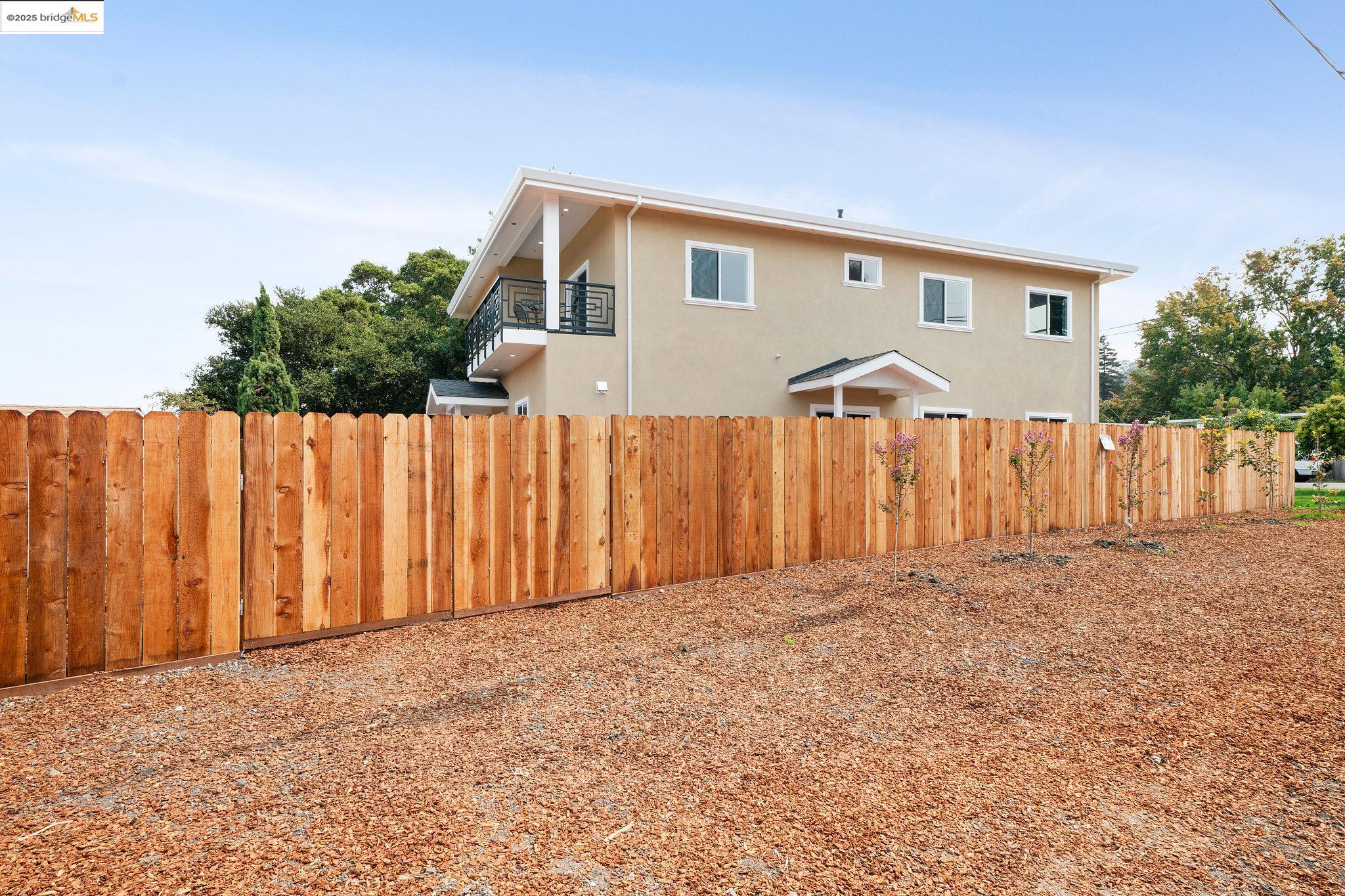 4511 Elmwood Road El Sobrante, CA 94803 - Photo 39 of 42 a front view of a house with a yard