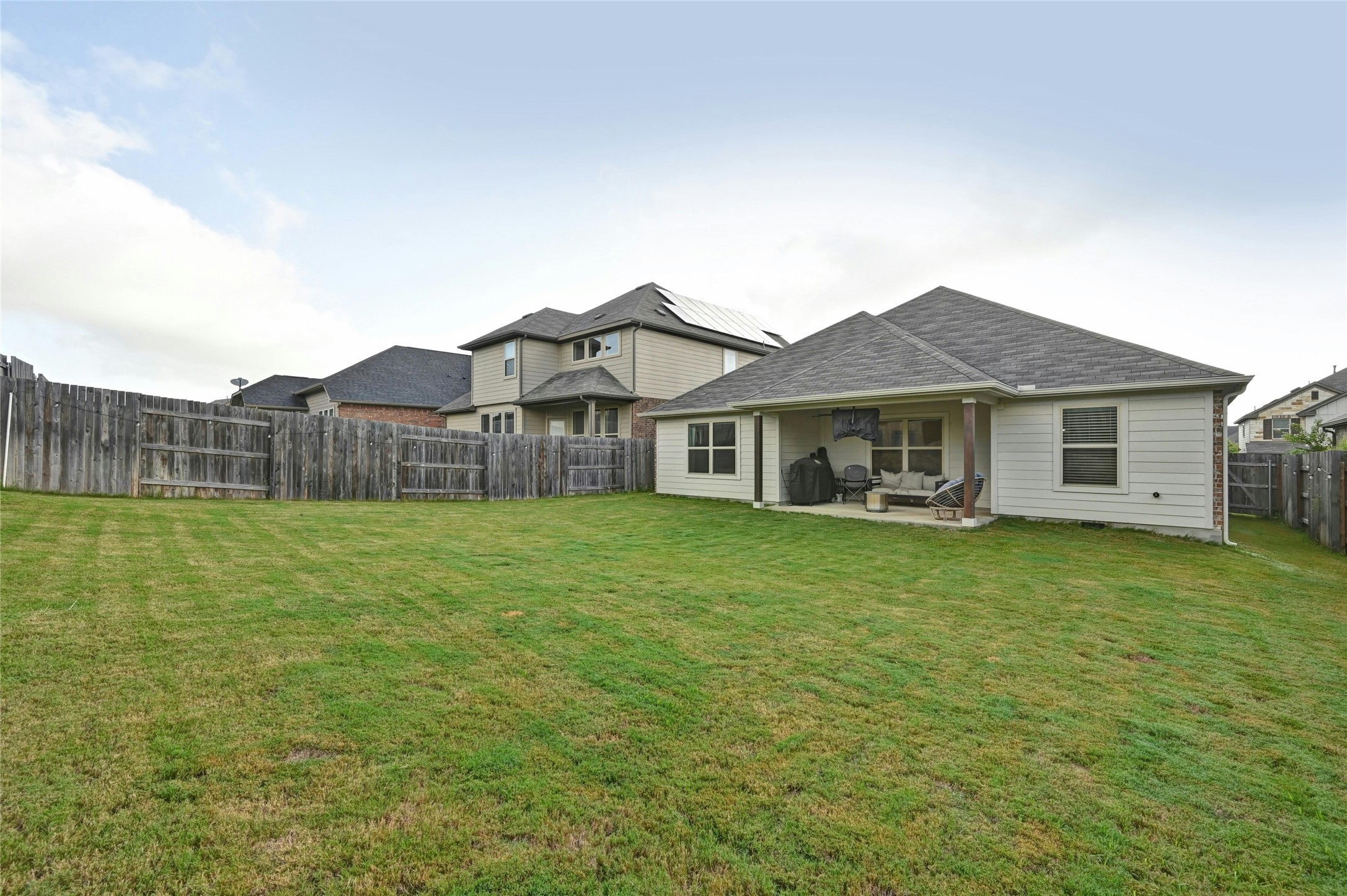 757 Cherrystone Loop Buda, TX 78610 - Photo 24 of 33 Large backyard perfect for gatherings!