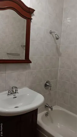 a bathroom with a toilet and a sink