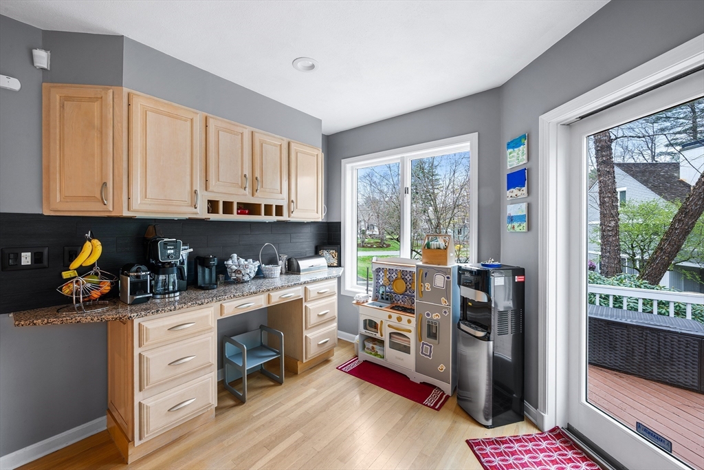 3 Choate Lane Ipswich, MA 01938 - Photo 11 of 39 a kitchen with a refrigerator a stove top oven and a window