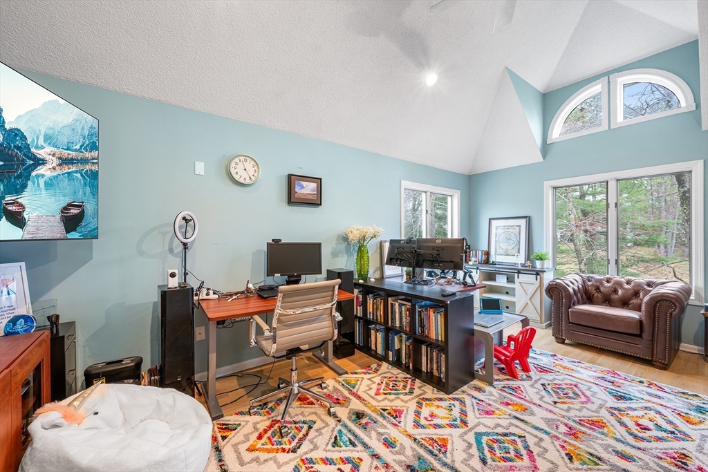 3 Choate Lane Ipswich, MA 01938 - Photo 17 of 39 a living room with furniture a rug and a large window