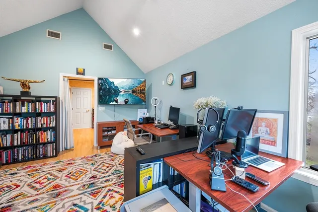 a workspace with furniture and book shelf