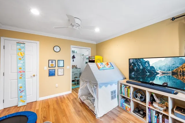 a view of living room with furniture and flat screen tv