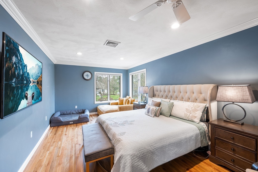 3 Choate Lane Ipswich, MA 01938 - Photo 23 of 39 a bedroom with bed and wooden floor