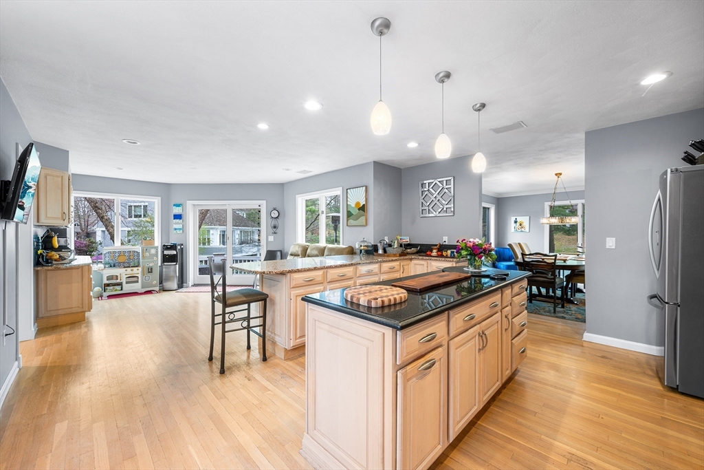 3 Choate Lane Ipswich, MA 01938 - Photo 10 of 39 a kitchen with stainless steel appliances granite countertop a lot of counter space and wooden floors