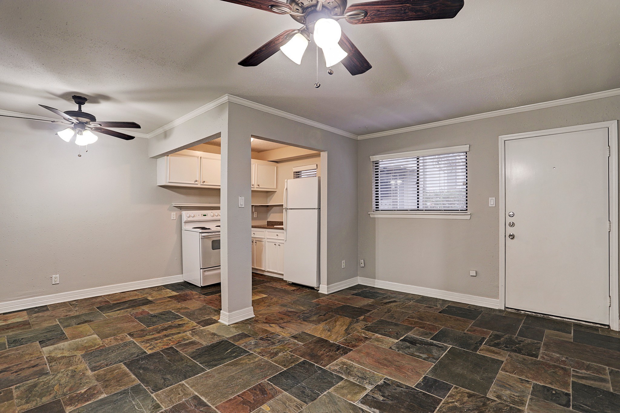 a very nice looking room with a ceiling fan