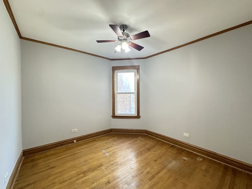 4020 West Cornelia Avenue, Unit 2 Chicago, IL 60641 - Photo 17 of 20 a view of empty room with window