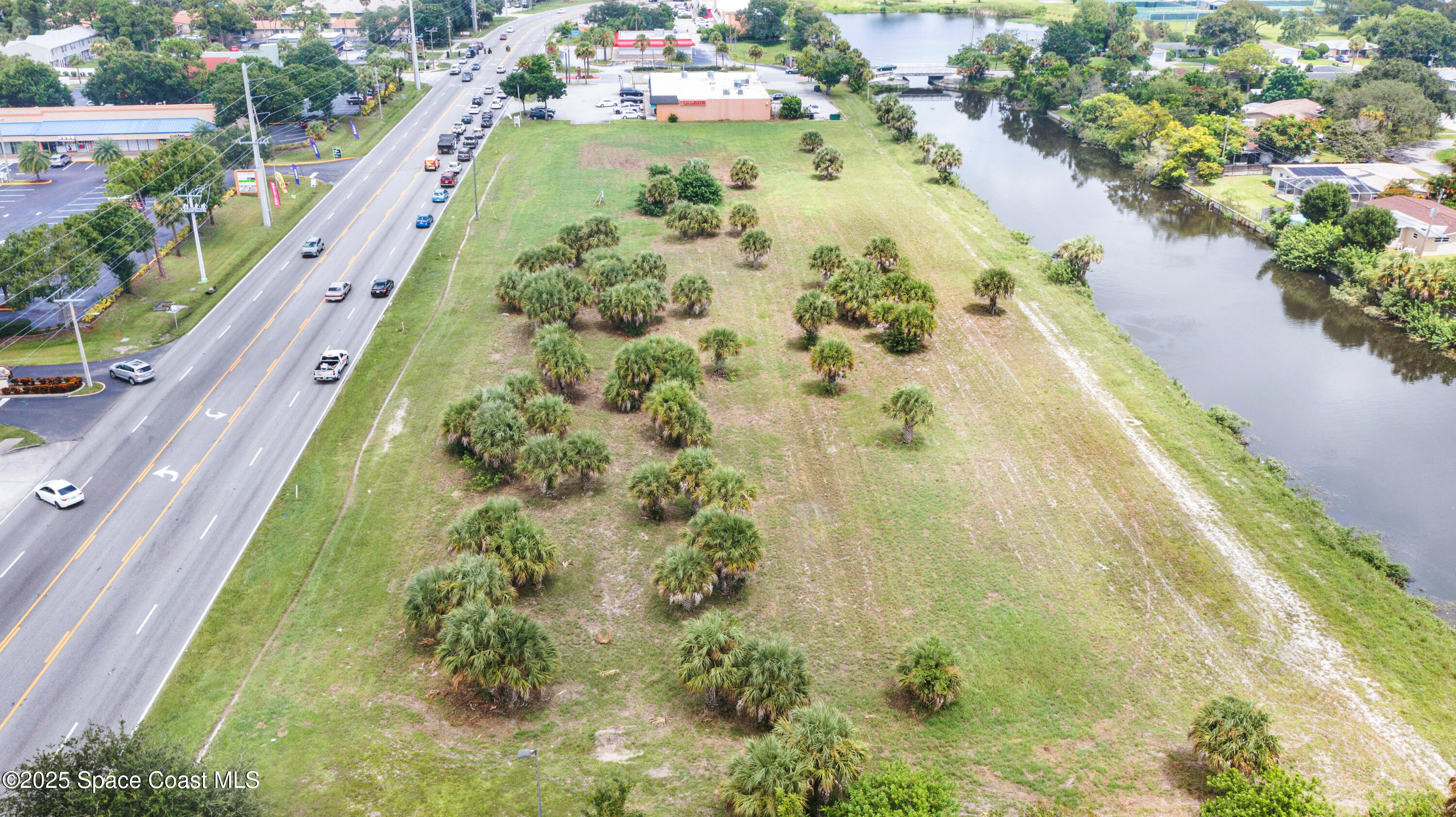 551 North Wickham Road Melbourne, FL 32935 - Photo 4 of 10 a view of a city