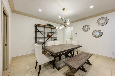 a utility room with sink dryer and washer