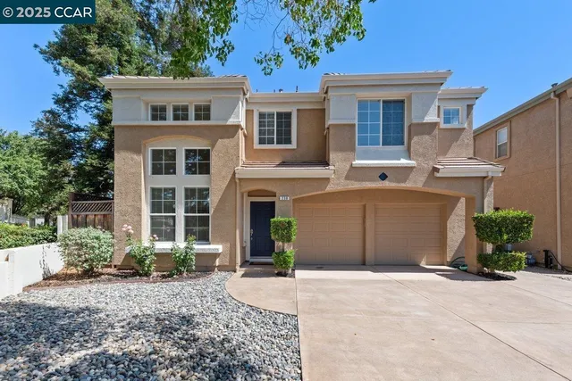 a house view with a garden space