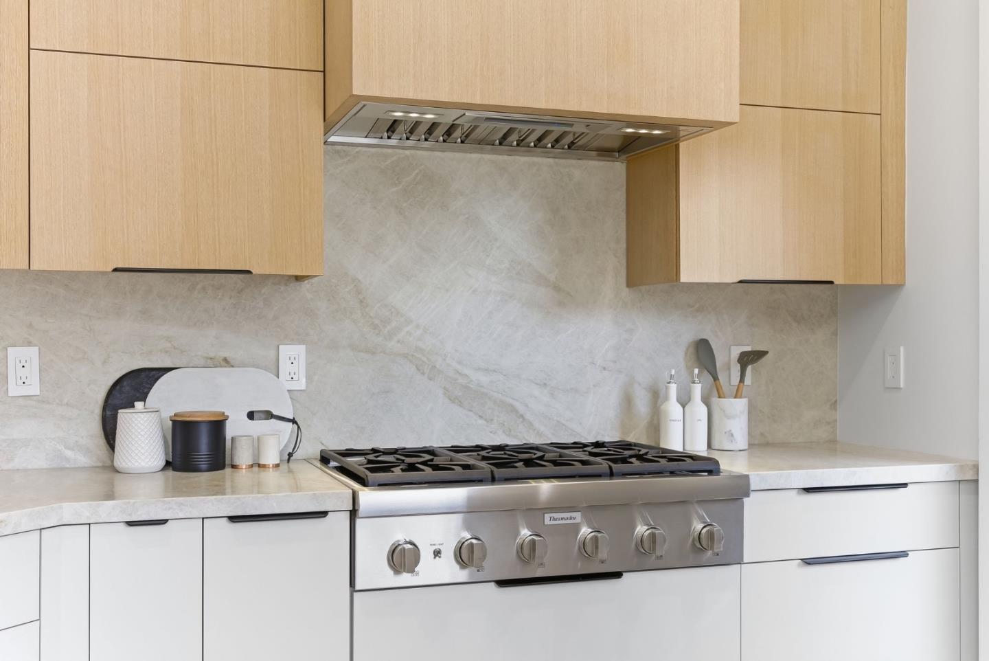 845 Pollard Road Los Gatos, CA 95032 - Photo 18 of 47 a stove top oven sitting inside of a kitchen