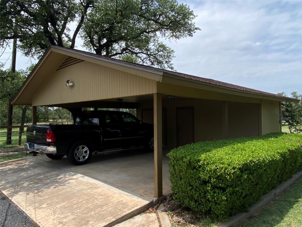 140 Oak Ridge Road Georgetown, TX 78628 - Photo 17 of 40 a view of a car in front of house