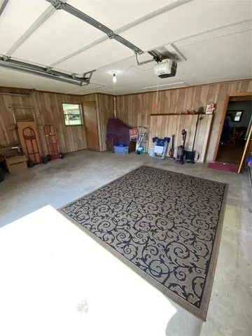 a living room with couch and a window