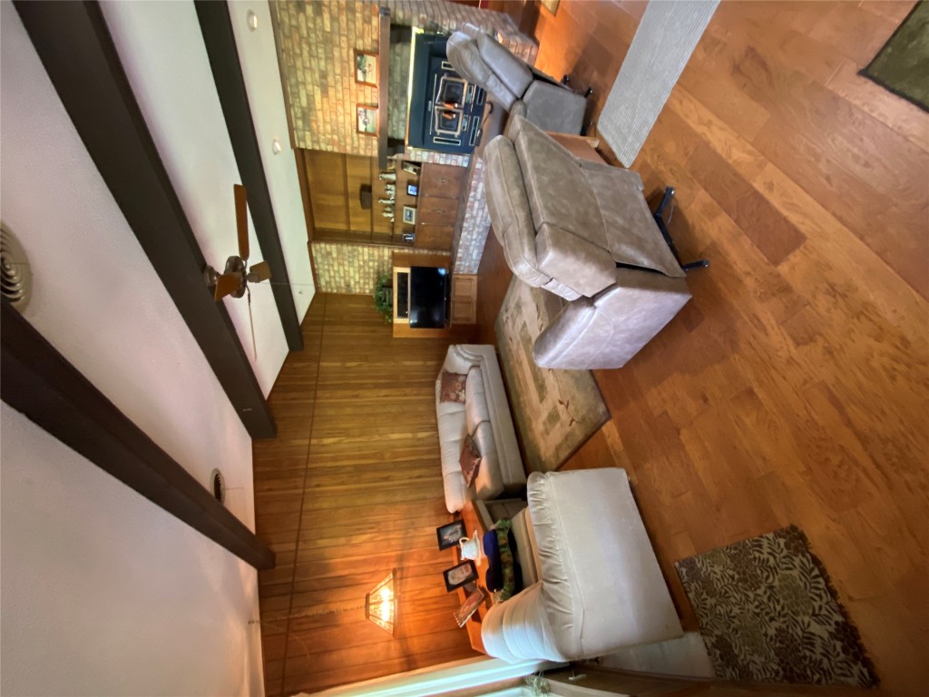 140 Oak Ridge Road Georgetown, TX 78628 - Photo 24 of 40 a living room with furniture and a flat screen tv