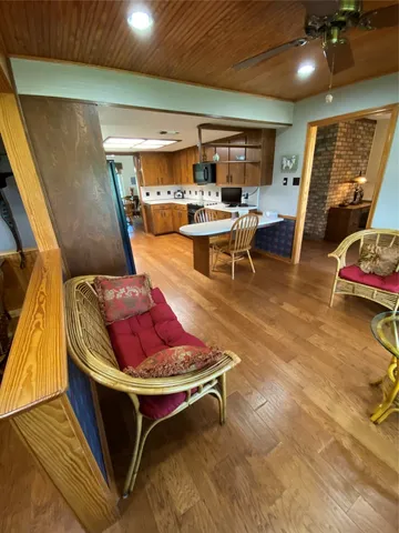 a view of a kitchen with furniture and a kitchen