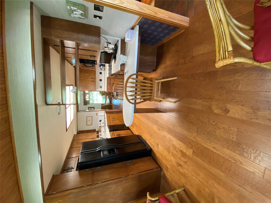 140 Oak Ridge Road Georgetown, TX 78628 - Photo 29 of 40 a dining room with stainless steel appliances kitchen island granite countertop a refrigerator and a stove