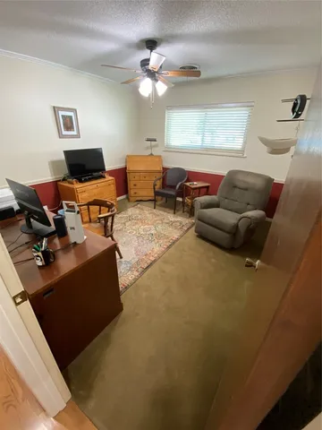a bathroom with a sink and mirror with toilet