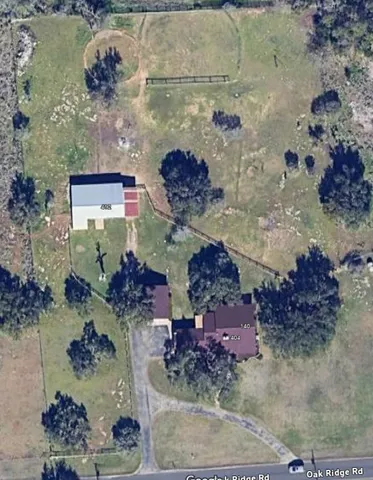 a front view of a house with a yard and porch