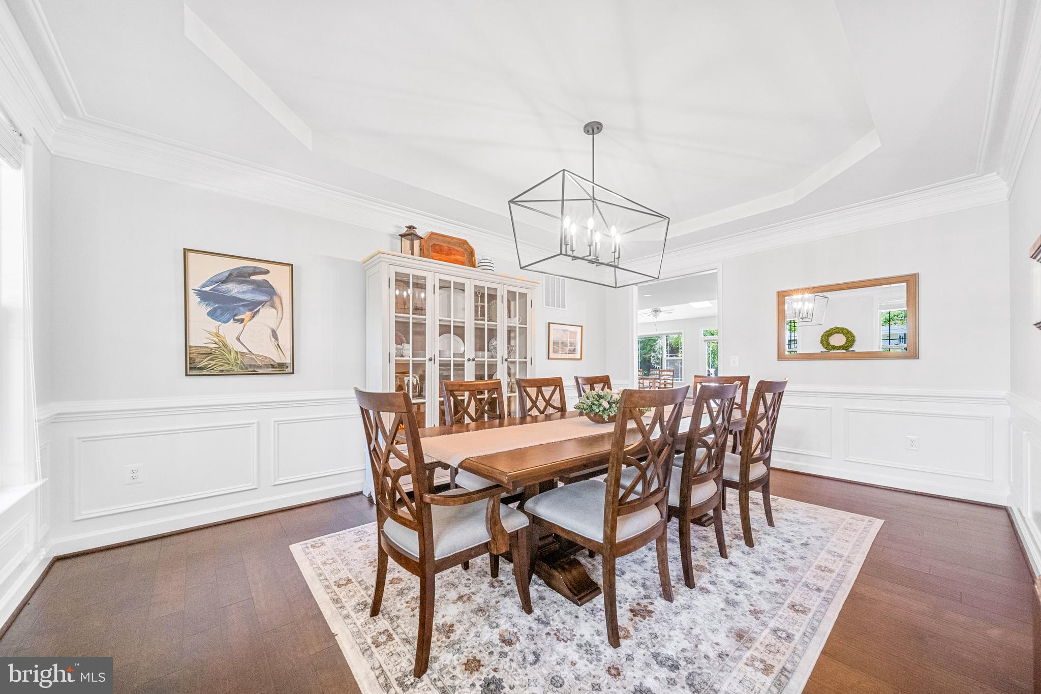 1639 Macon Street McLean, VA 22101 - Photo 11 of 86 a view of a dining room with furniture wooden floor and chandelier