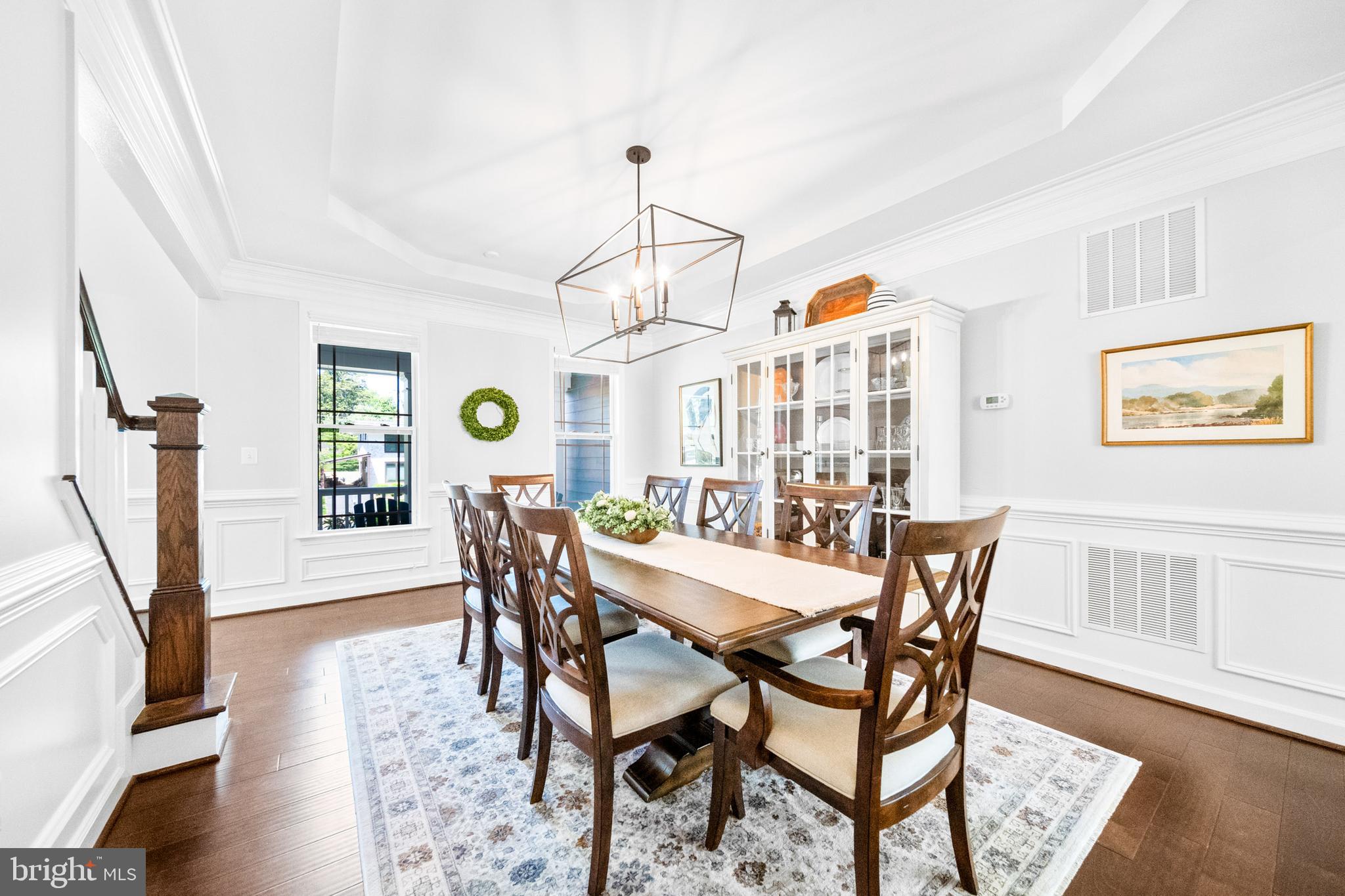 1639 Macon Street McLean, VA 22101 - Photo 12 of 86 a view of a dining room with furniture and wooden floor