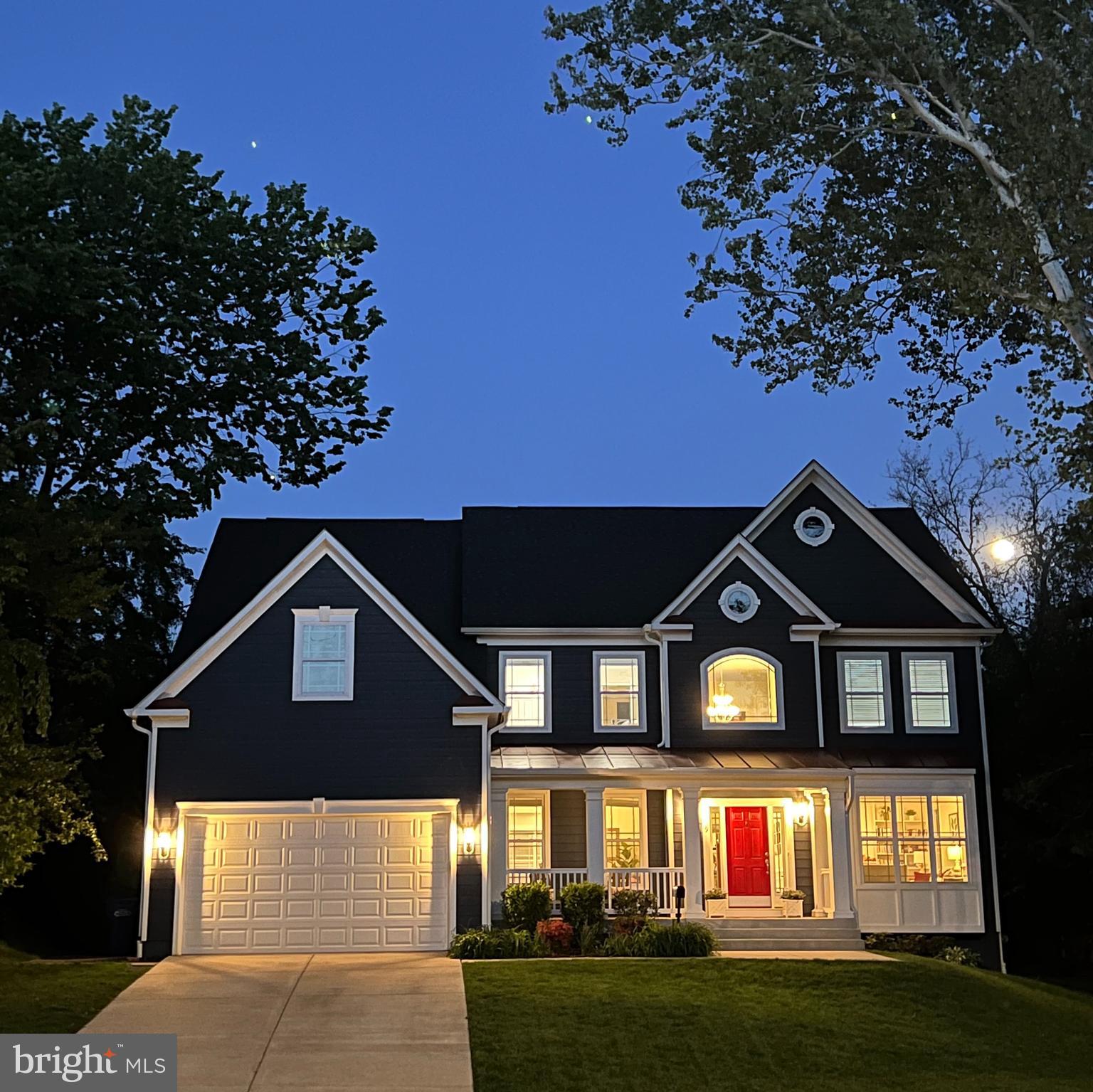 1639 Macon Street McLean, VA 22101 - Photo 2 of 86 a front view of a house with a yard