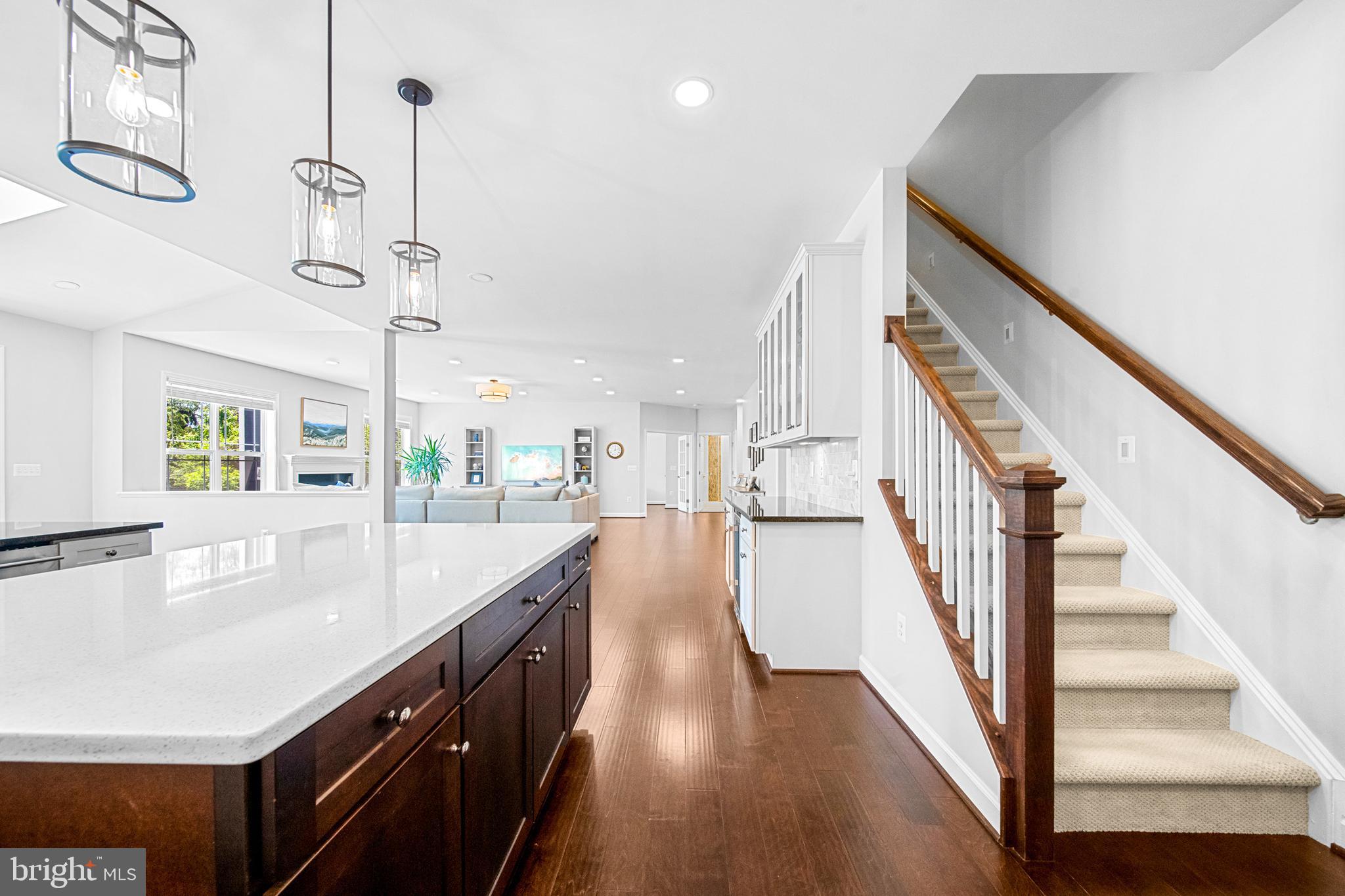 1639 Macon Street McLean, VA 22101 - Photo 26 of 86 a view of a kitchen with kitchen island wooden floor and stainless steel appliances