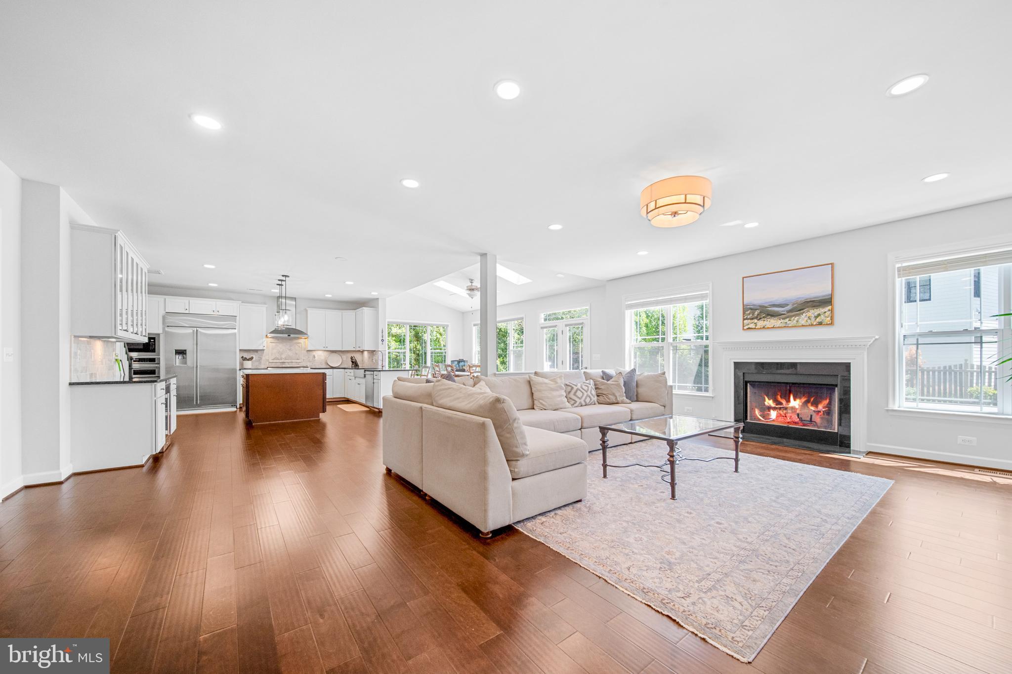 1639 Macon Street McLean, VA 22101 - Photo 27 of 86 a living room with fireplace furniture and a wooden floor
