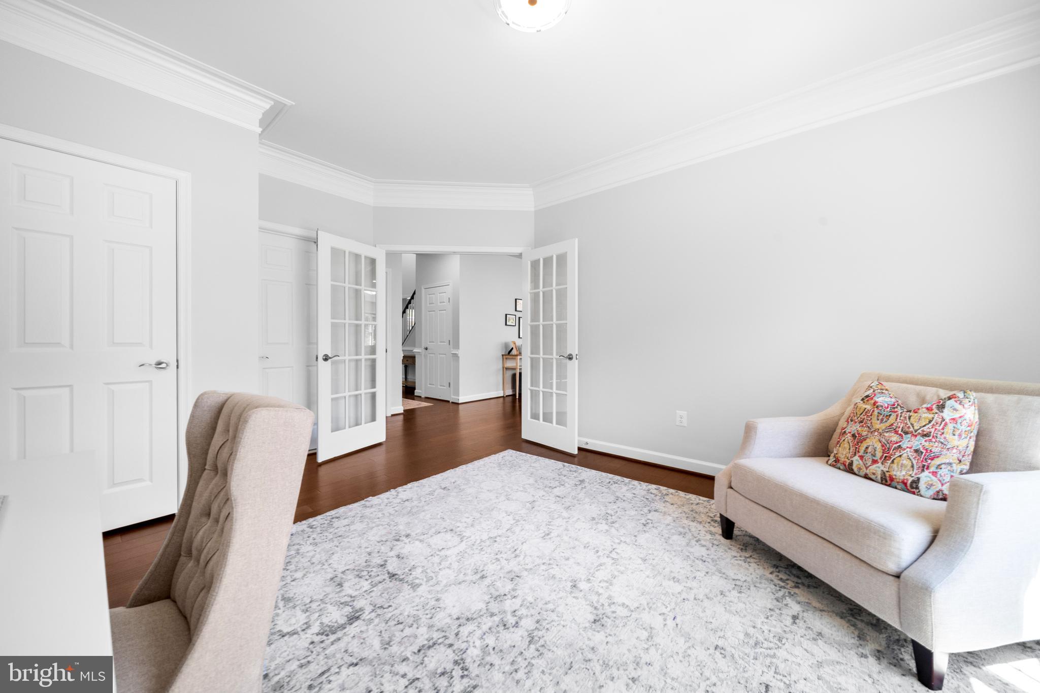 1639 Macon Street McLean, VA 22101 - Photo 32 of 86 a spacious bedroom with a bed and furniture
