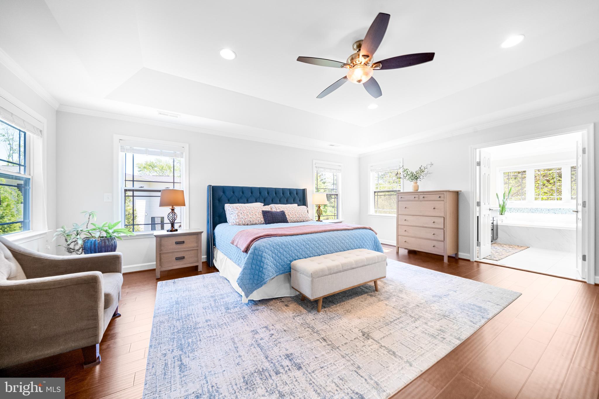 1639 Macon Street McLean, VA 22101 - Photo 37 of 86 a spacious bedroom with a bed a couch and a window