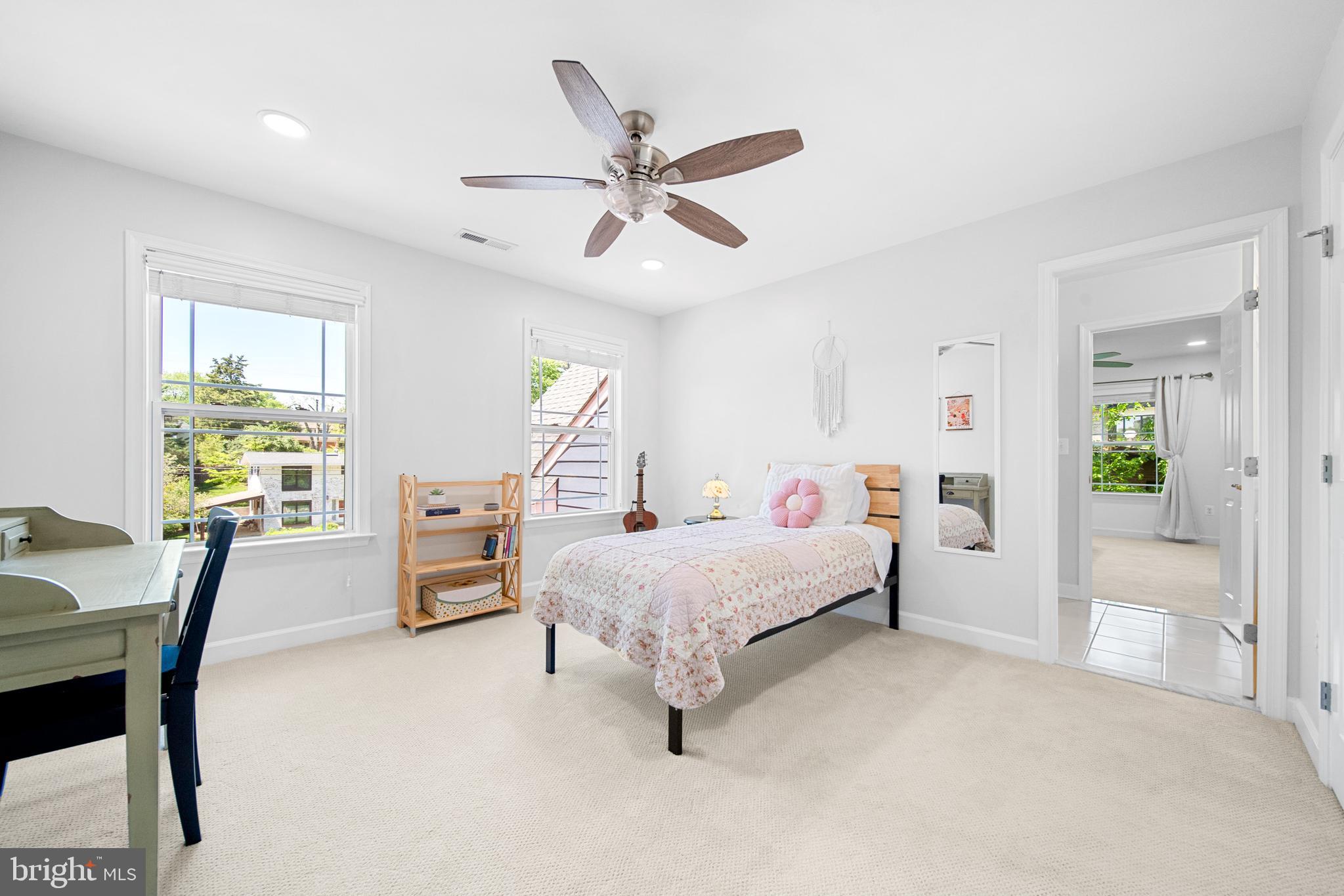 1639 Macon Street McLean, VA 22101 - Photo 48 of 86 a bedroom with a bed and a table