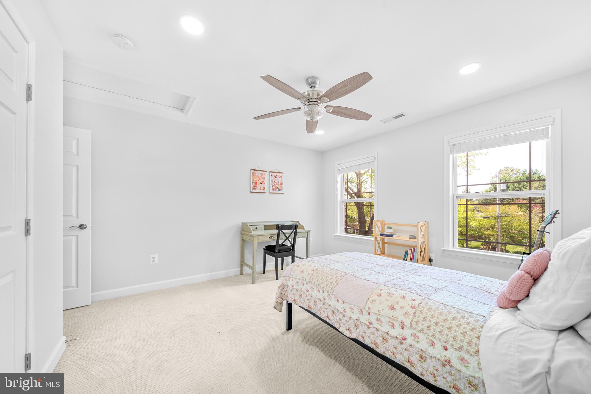 1639 Macon Street McLean, VA 22101 - Photo 49 of 86 a bedroom with a bed and a large window with the outer view