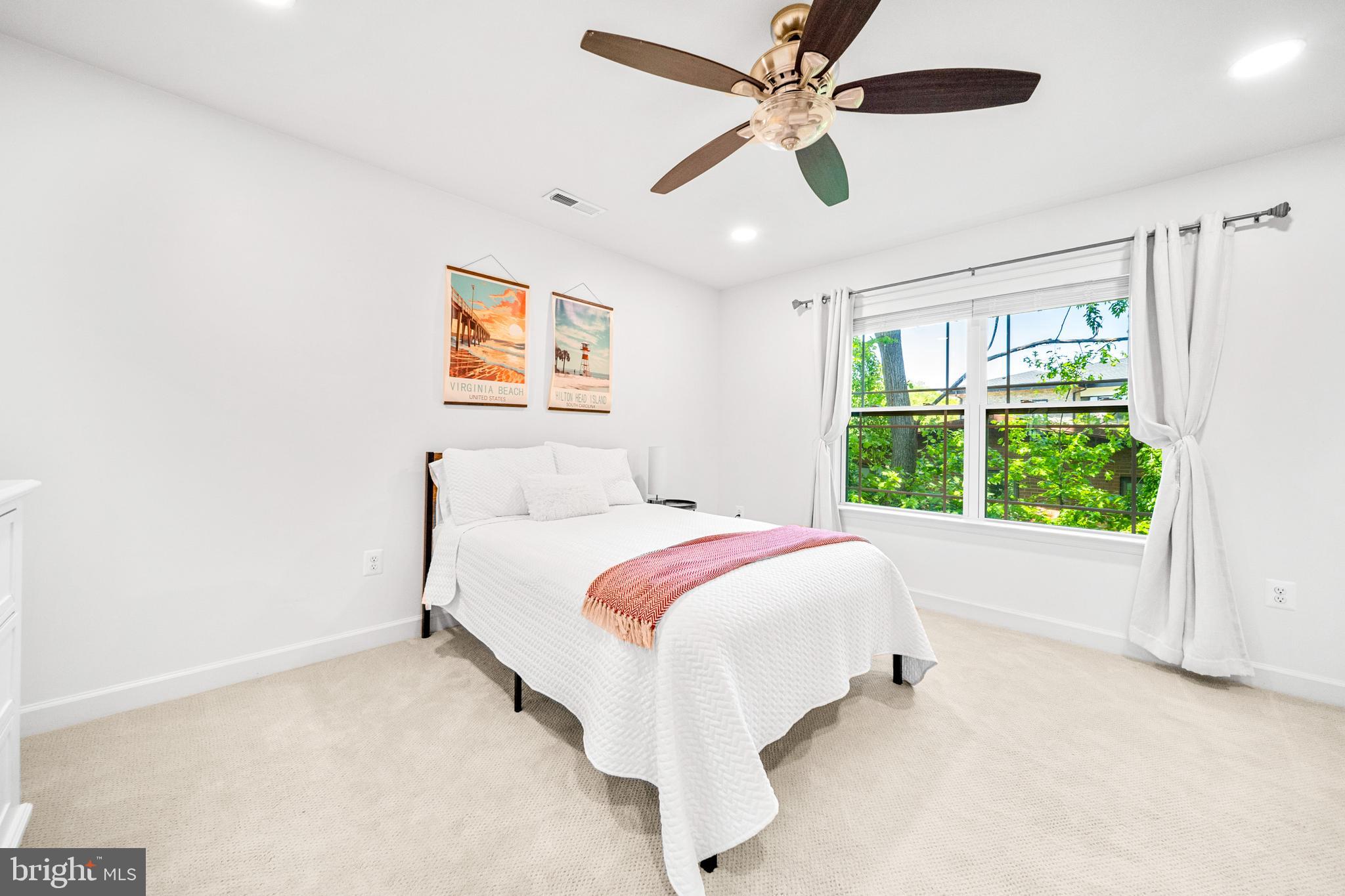 1639 Macon Street McLean, VA 22101 - Photo 50 of 86 a bed room with a bed and a large window