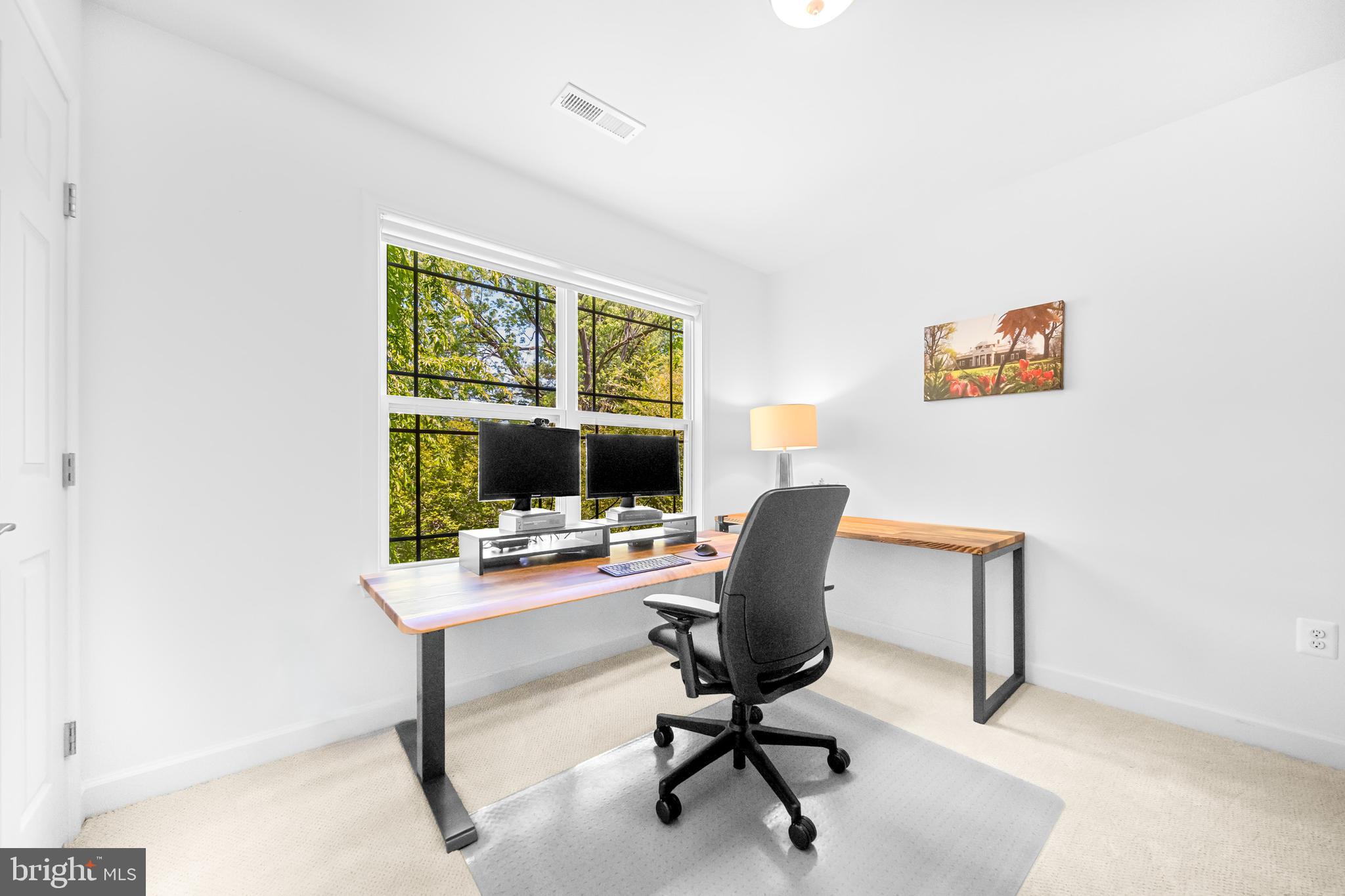 1639 Macon Street McLean, VA 22101 - Photo 53 of 86 a view of a workspace with furniture and a window