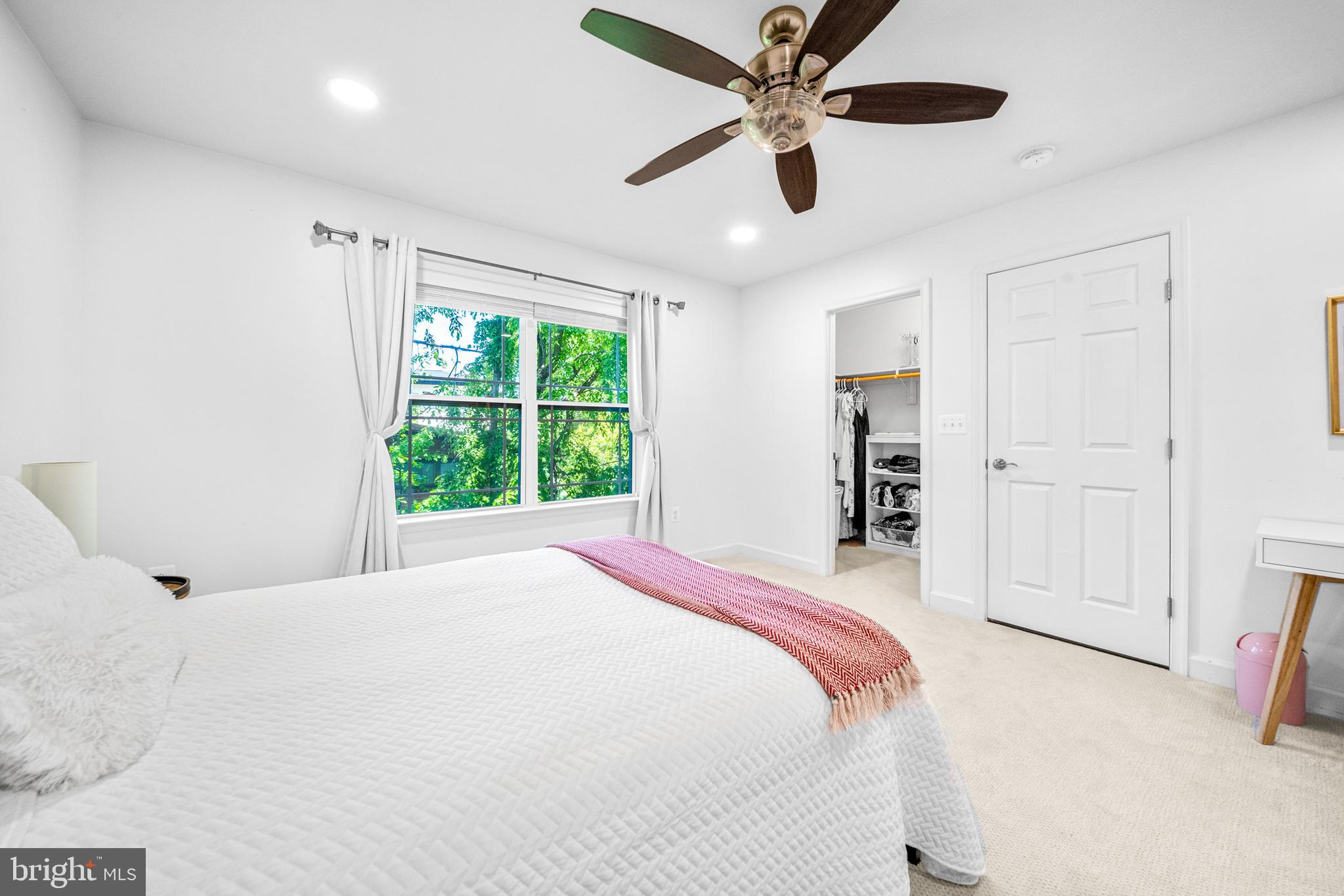 1639 Macon Street McLean, VA 22101 - Photo 57 of 86 a bedroom with a large bed and a window