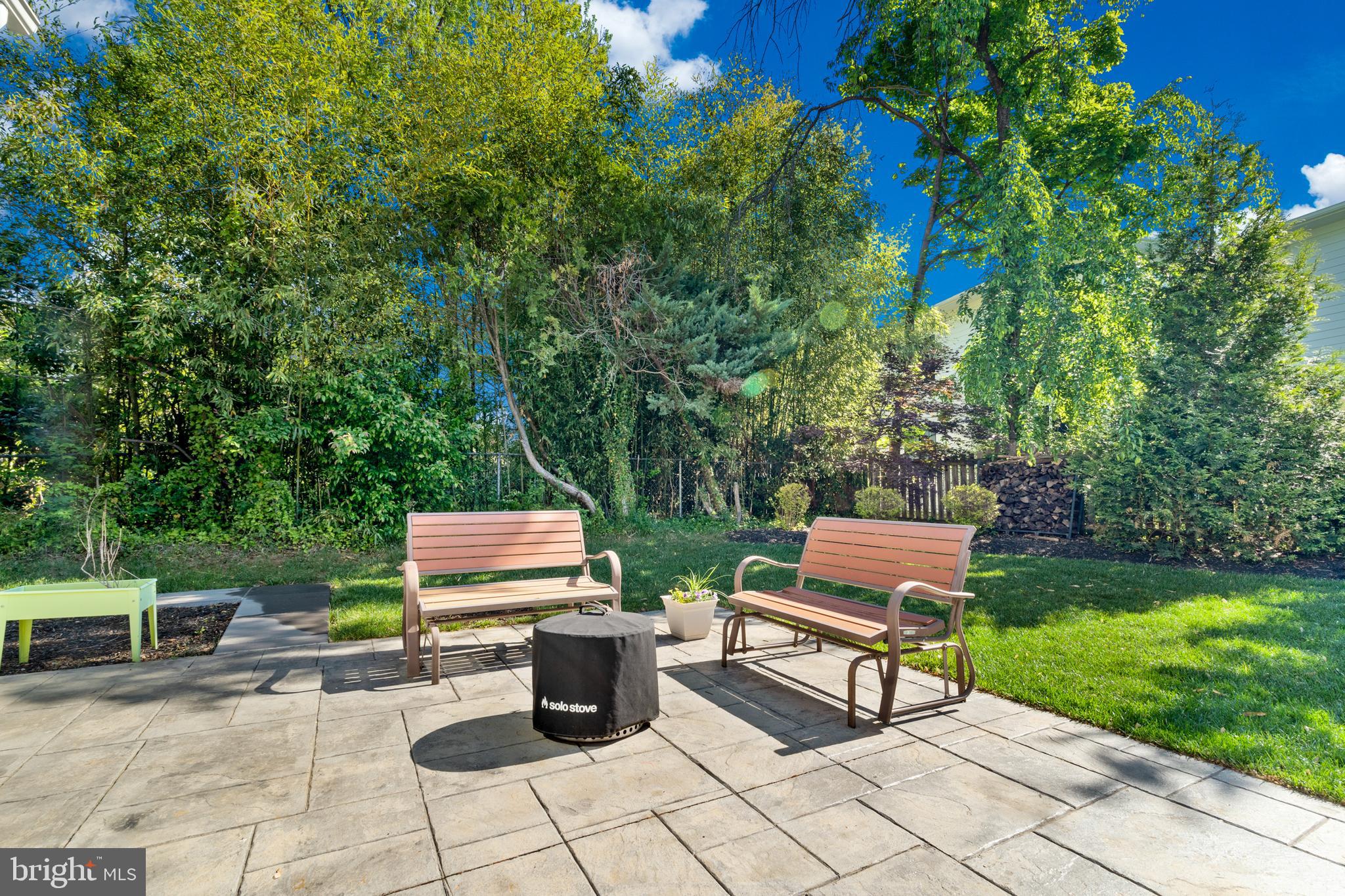 1639 Macon Street McLean, VA 22101 - Photo 77 of 86 a view of a sitting area with chairs and wooden fence