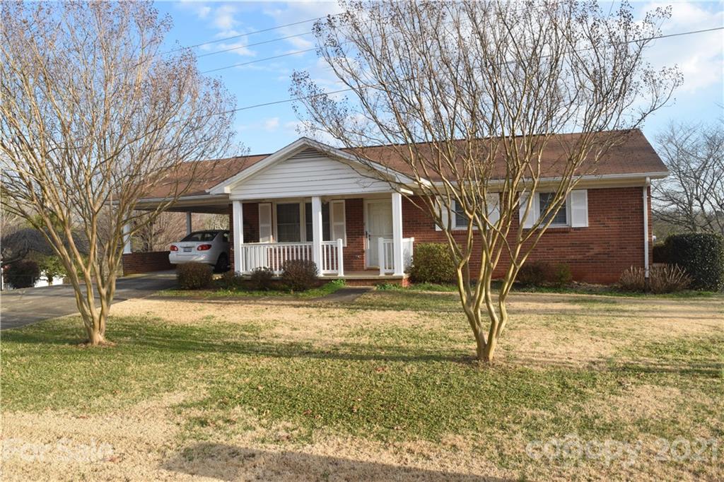 3189 Short Road Hickory, NC 28602 - Photo 2 of 24 a front view of a house with a yard
