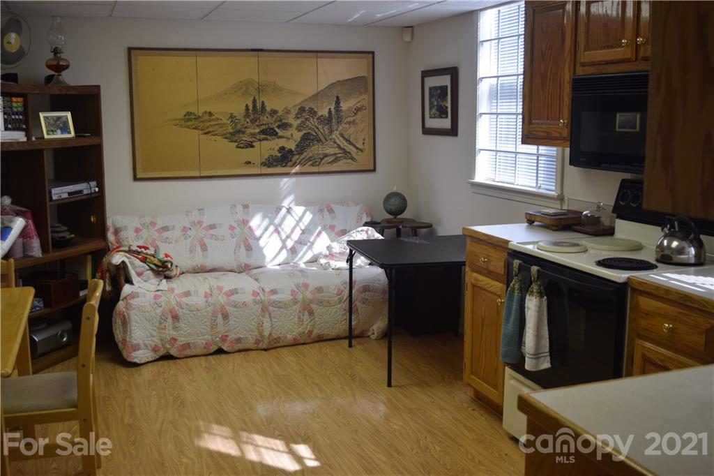 3189 Short Road Hickory, NC 28602 - Photo 11 of 24 a bedroom with a bed and a painting on the wall