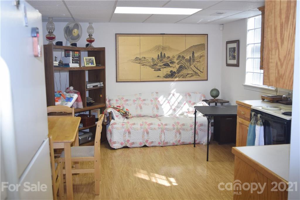 3189 Short Road Hickory, NC 28602 - Photo 12 of 24 a living room with furniture and a kitchen