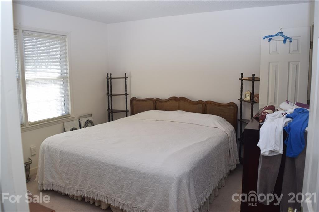 3189 Short Road Hickory, NC 28602 - Photo 17 of 24 a bedroom with a bed and a window