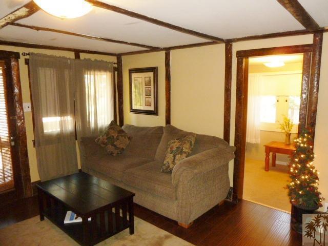 809 Talmadge Road Big Bear Lake, CA 92315 - Photo 12 of 25 a living room with couch and a table