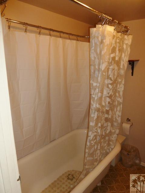 809 Talmadge Road Big Bear Lake, CA 92315 - Photo 16 of 25 a bathroom with a shower and a tub