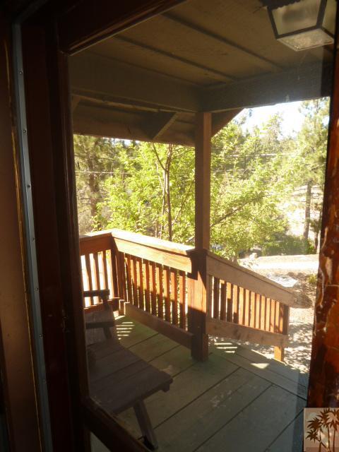 809 Talmadge Road Big Bear Lake, CA 92315 - Photo 22 of 25 a view of a porch with wooden floor