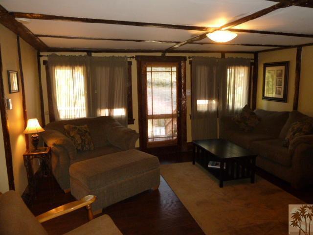809 Talmadge Road Big Bear Lake, CA 92315 - Photo 10 of 25 a living room with furniture and a potted plant