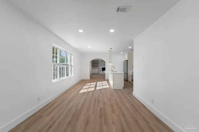 a view of an empty room and window