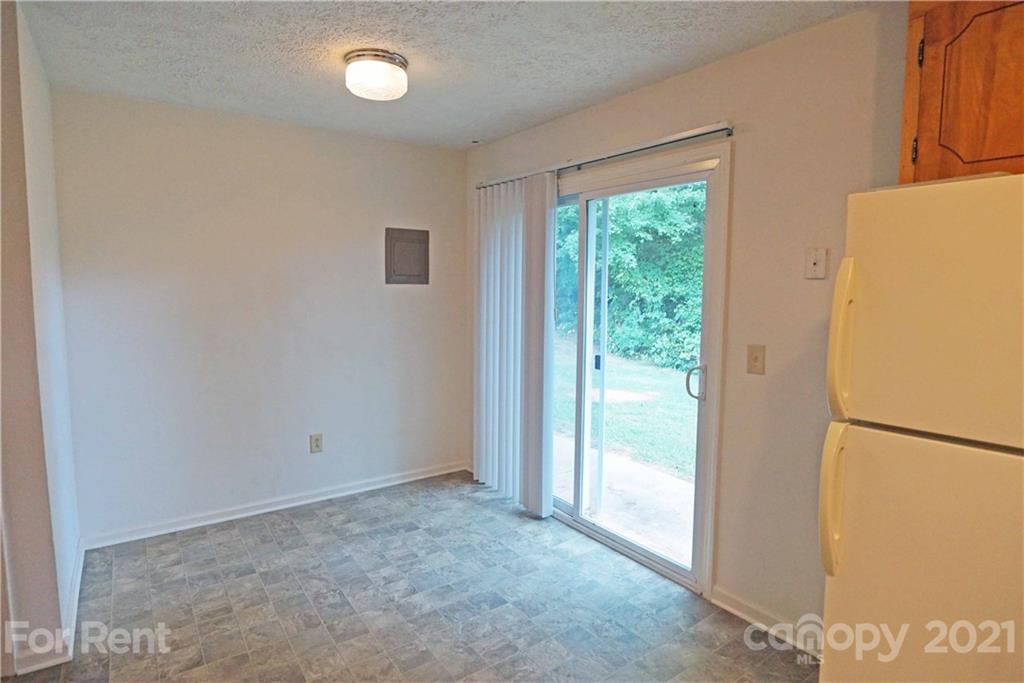 4887 County Home Road, Unit G2 Conover, NC 28613 - Photo 3 of 8 a view of an empty room with a window