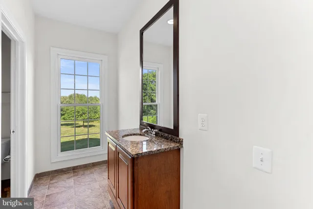 a utility room with two windows