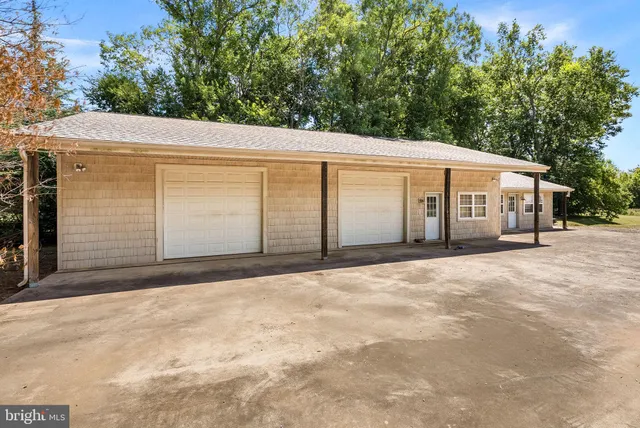 a front view of a house with a garage