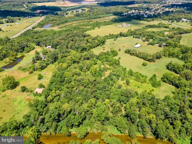 a view of a yard with swimming pool